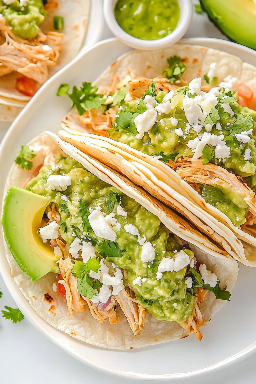 Crockpot Chicken Tacos with Avocado-Cilantro Sauce
