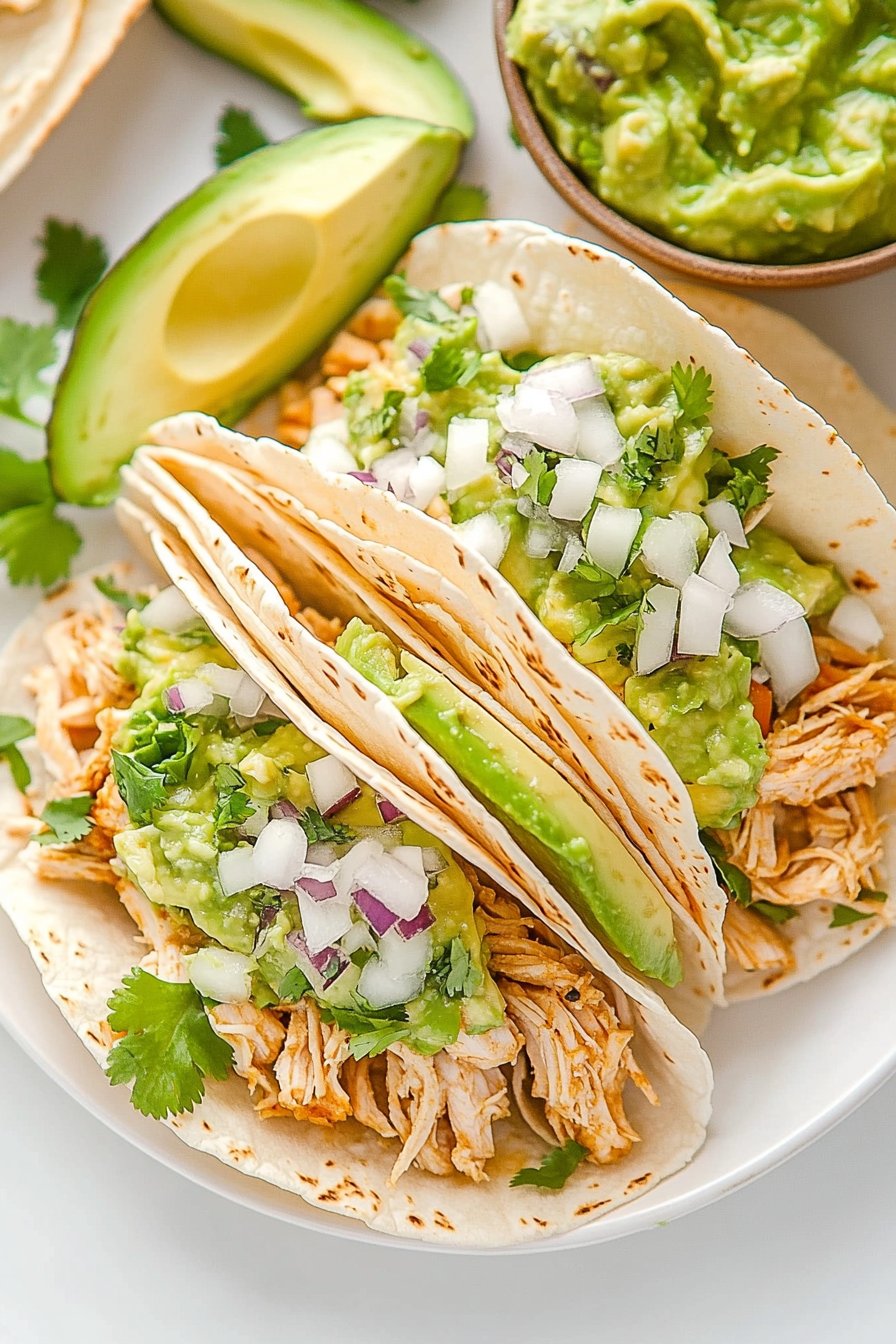 Crockpot Chicken Tacos with Avocado-Cilantro Sauce